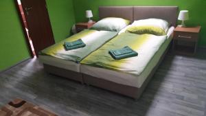 Posteľ alebo postele v izbe v ubytovaní Ubytovanie House