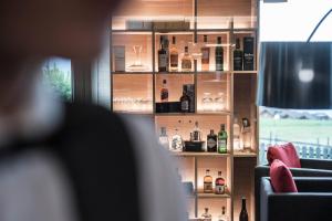 Nápoje v ubytovaní Hotel Ambet
