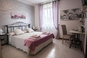 Postel nebo postele na pokoji v ubytování B&B Dolce Risveglio
