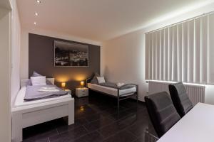 Postel nebo postele na pokoji v ubytování Hotel am Rosenplatz,24 Stunden Check in, kostenfreie Parkplätze