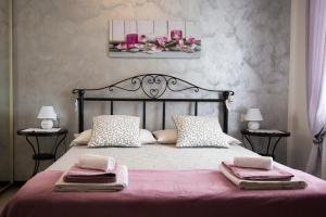 Postel nebo postele na pokoji v ubytování B&B Dolce Risveglio