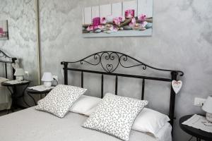 Postel nebo postele na pokoji v ubytování B&B Dolce Risveglio