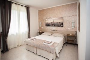 Postel nebo postele na pokoji v ubytování B&B Dolce Risveglio