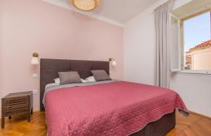 Posteľ alebo postele v izbe v ubytovaní Apartment Dox