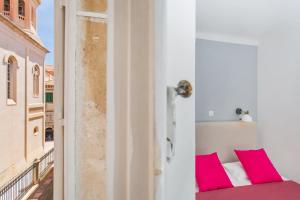 Posteľ alebo postele v izbe v ubytovaní Apartment Dox