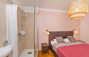 Posteľ alebo postele v izbe v ubytovaní Apartment Dox