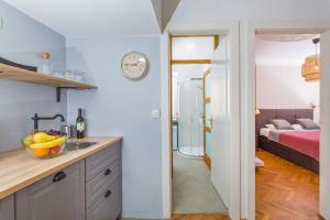 Posteľ alebo postele v izbe v ubytovaní Apartment Dox