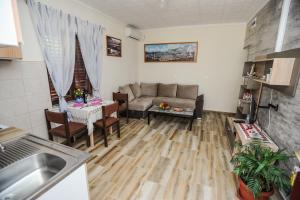 Kuchyň nebo kuchyňský kout v ubytování Apartments Phoenix