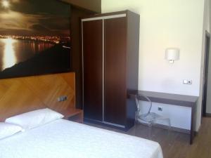 Ein Bett oder Betten in einem Zimmer der Unterkunft Hotel Alén do Mar