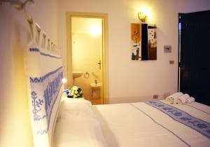 Postel nebo postele na pokoji v ubytování Hotel Montiruju