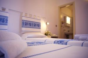 Postel nebo postele na pokoji v ubytování Hotel Montiruju