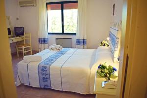 Postel nebo postele na pokoji v ubytování Hotel Montiruju