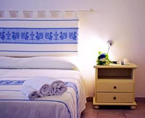 Postel nebo postele na pokoji v ubytování Hotel Montiruju