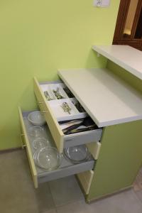 Kuchyňa alebo kuchynka v ubytovaní Apartament Raz Dwa Trzy