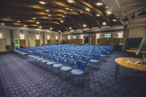 a large room with rows of chairs in it at The Jubilee Hotel in Nottingham
