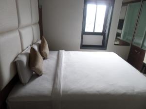 Hotel Raj Palace客房内的一张或多张床位
