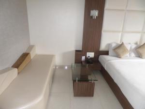 Hotel Raj Palace客房内的一张或多张床位