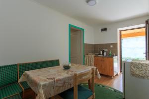 Kuchyň nebo kuchyňský kout v ubytování Fortuna Apartments + 21 fotografií