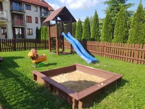 Vonkajšia záhrada v ubytovaní Aba Apartamenty