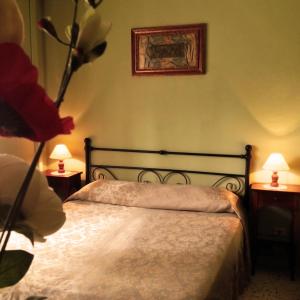 Posteľ alebo postele v izbe v ubytovaní Candalù - Villa Giardinata