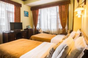 Cama ou camas em um quarto em Hotel Excelsior