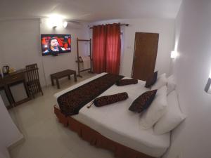 Postel nebo postele na pokoji v ubytování Hotel Sunray + 37 fotografií