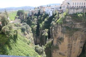 a city on the side of a mountain at Buenavista Apartment in Ronda
