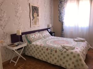 Postel nebo postele na pokoji v ubytování Alojamientos Iruña