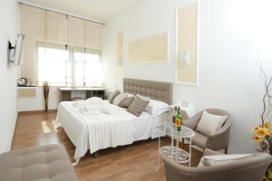 Postel nebo postele na pokoji v ubytování Millennium Gold Hotel + 37 fotografií