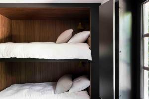 
A bunk bed or bunk beds in a room at Loft Living Garden Suite
