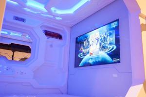 TV a/nebo společenská místnost v ubytování Izzzleep Aeropuerto Terminal 1 + 13 fotografií