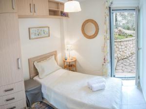 Postel nebo postele na pokoji v ubytování Villa Jiulita + 11 fotografií