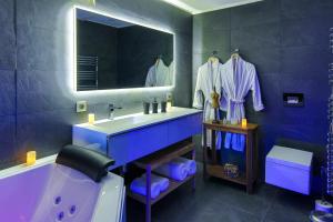 Ένα μπάνιο στο Suites Residences Spa