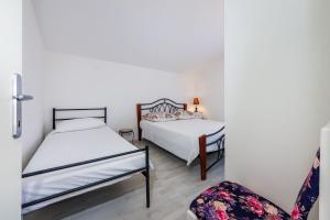 Postel nebo postele na pokoji v ubytování Apartment Juresko