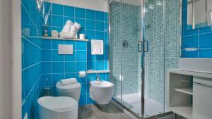 Vannituba majutusasutuses Smart Suite & Apartments