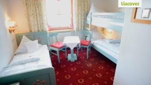 Letto o letti in una camera di Gastehaus Wolf