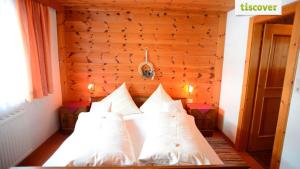 Letto o letti in una camera di Gastehaus Wolf