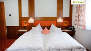 Letto o letti in una camera di Gastehaus Wolf