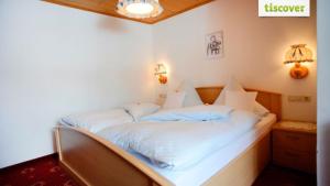 Letto o letti in una camera di Gastehaus Wolf