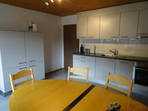Kuchyň nebo kuchyňský kout v ubytování Apartments Carmena