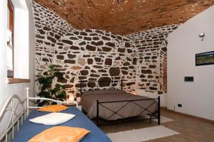Krevet ili kreveti u jedinici u objektu Residenza Maria Antonia - Historical Suite