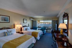 Ένα ή περισσότερα κρεβάτια σε δωμάτιο στο Browns Wharf Inn