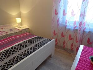 Postel nebo postele na pokoji v ubytování I & S Apartments