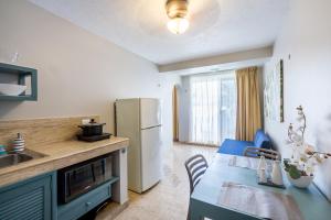 Kuchyň nebo kuchyňský kout v ubytování Mar Azul Suites 5ta Av + 28 fotografií