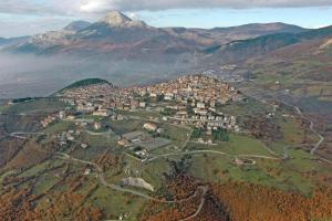 an aerial view of a town in the mountains at Il Castello in Viggiano