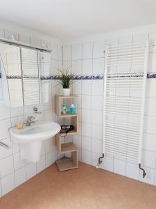 Kylpyhuone majoituspaikassa Ferienwohnung Ulmrich