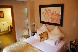 Voodi või voodid majutusasutuse Riad Flam & Spa toas