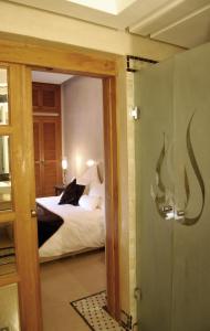 Voodi või voodid majutusasutuse Riad Flam & Spa toas