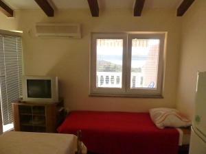 Postel nebo postele na pokoji v ubytování Apartments Vila Lavanda