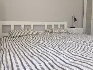 Posteľ alebo postele v izbe v ubytovaní Apartament Warszawska